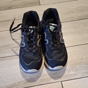 New Balance Black Sneakers with Holographic Logo